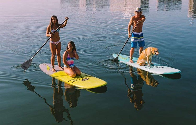 sup together on a two person paddle board