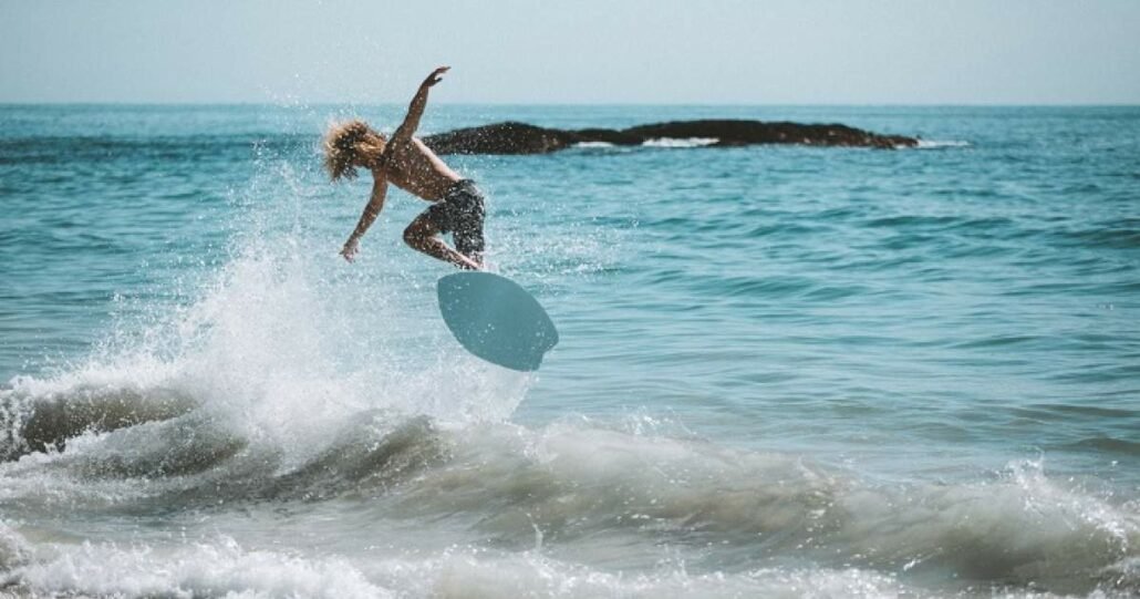 what is skimboarding